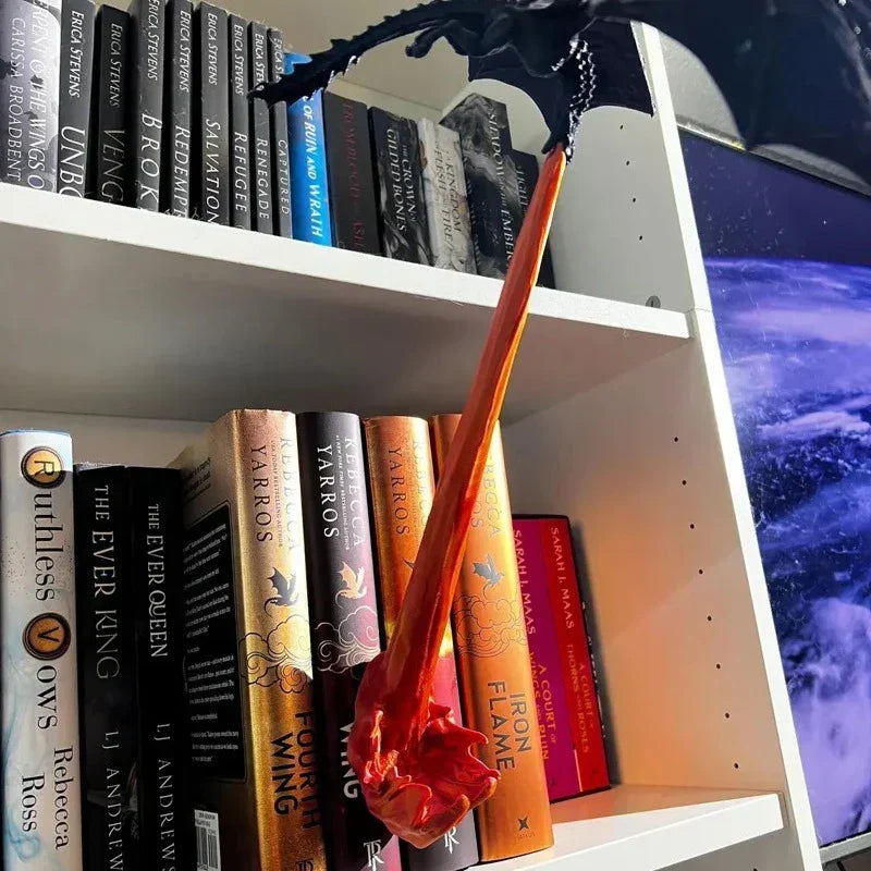 Dragon Book Lamp flame beam landing between fantasy books
